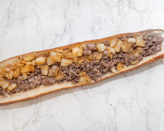 Ribeye and onions Belly Buster